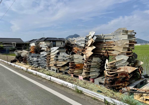 Metal anchors stored during summer on road side in Sanriku, Japan