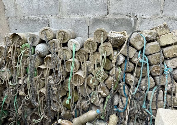 Brazil: Concrete anchors and rebar rods stacked for use in Brazilian farms to stabilize floating or submerged aquaculture setups.